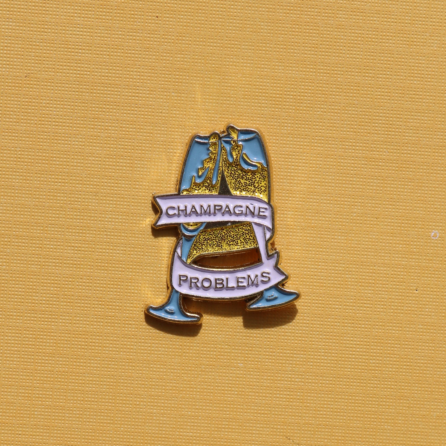 champagne problems pin